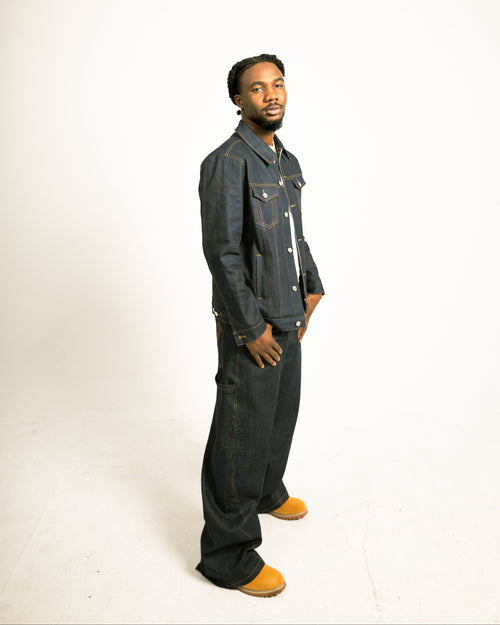 Man wearing a denim outfit on a white background